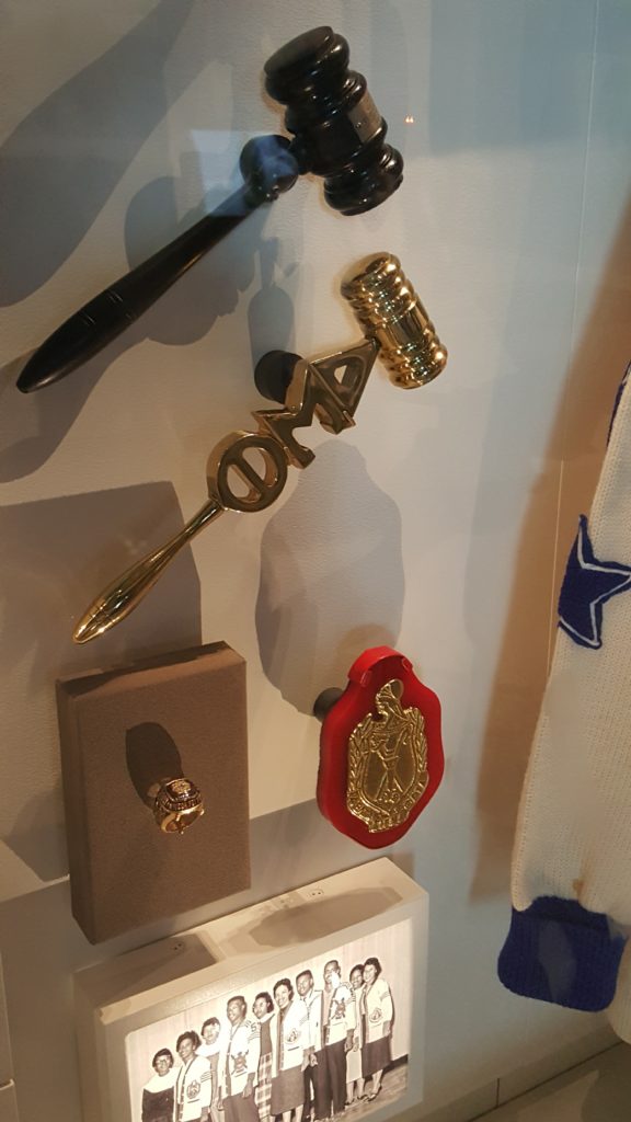 Delta Sigma Theta artifacts in the exhibit highlighting the birth of black Greek-lettered organizations.