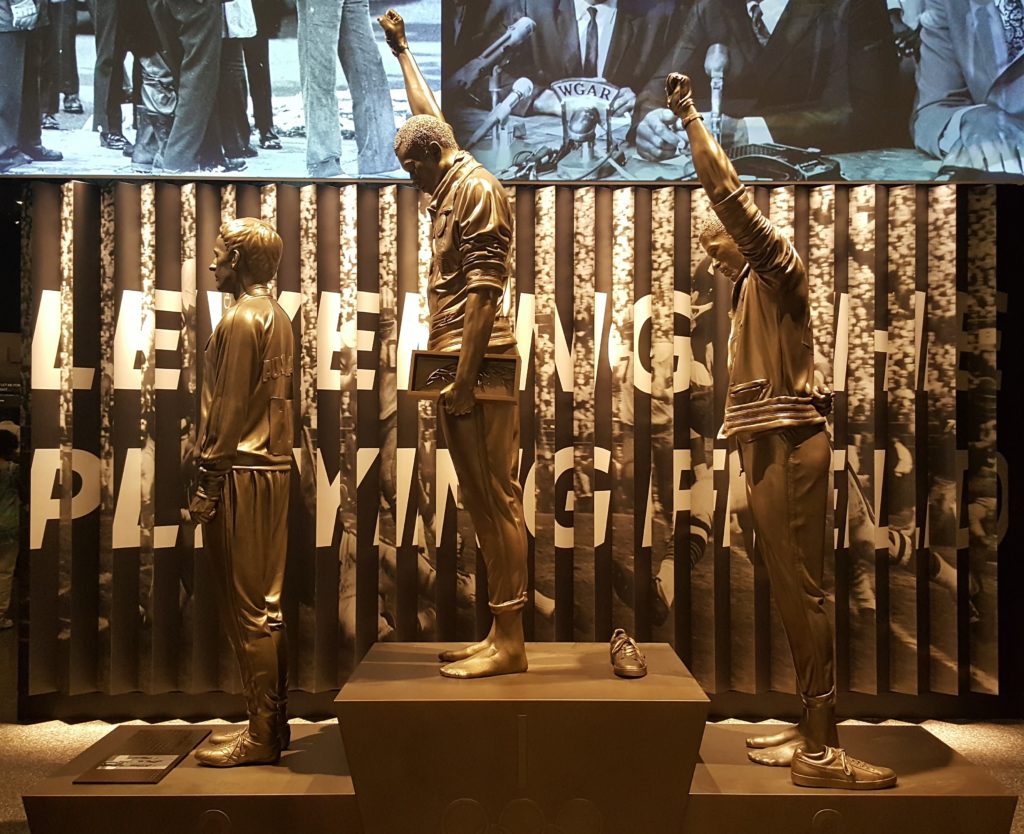 A statue of gold medalist Tommie Smith and bronze medalist John Carlos raising their fists in Black Power salute during the 1968 Summer Olympics in Mexico City.